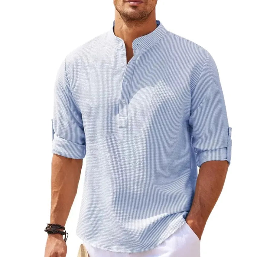 imagem da Camiseta Masculina de Linho Valor da Oron Store em fundo branco. Modelo disponível nas cores bege, branco, preto, azul, cinza e cinza escuro. Camiseta casual com tecido leve e respirável de linho e algodão, ideal para o verão 2025. Roupa masculina versátil, com caimento moderno e design elegante. Disponível nos tamanhos PP ao G3.